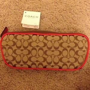 Coach eyeglass holder