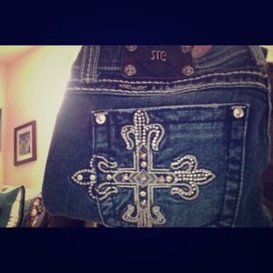 A pair Miss Me jeans. Size 29. Only worn twice.