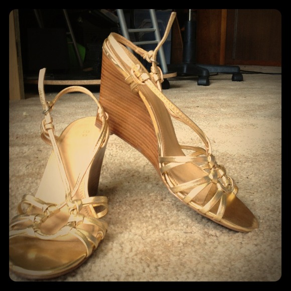 Gold wedged heels