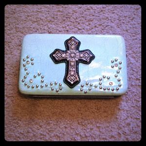 Mint green cross wallet.