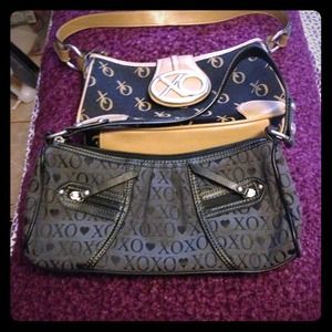 Two small XOXO purses.