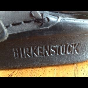 Birkenstocks black leather slip on