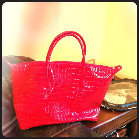 Faux red snake skin extra large bag.
