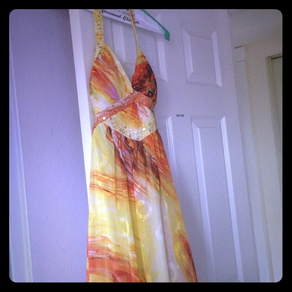 A long prom dress by Bee Darlin
