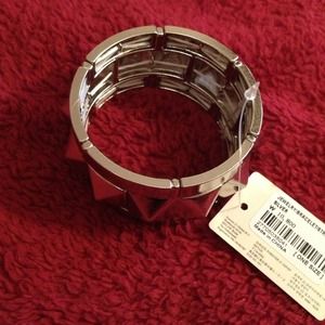 Silver stretch bracelet- Studded and very Retro