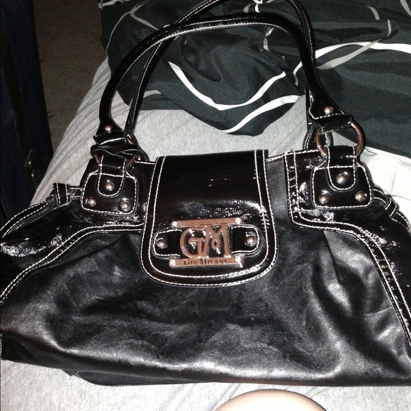 Milani black gently used purse