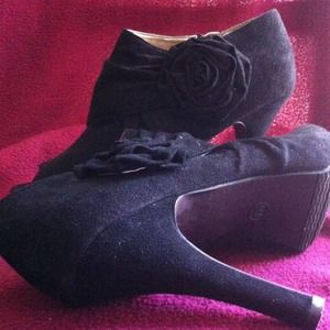 Black suede high heels