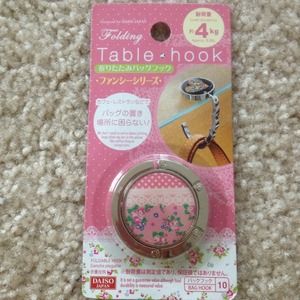 Folding table bag hook