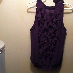 Sleeveless ruffled front shirt