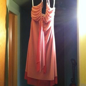 Light and dark pink dress ties around neck