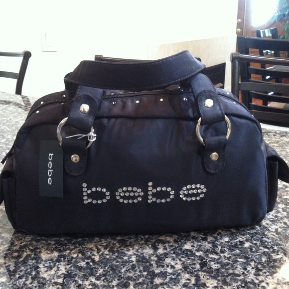 Bundle with black bebe wallet & bag.