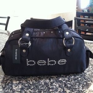 Bundle with black bebe wallet & bag.