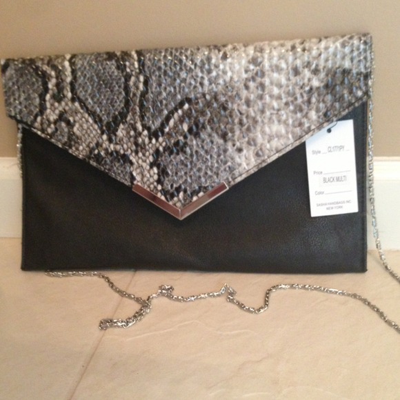 SOLD Clutch!Blk snakeskin w/silver removable strap