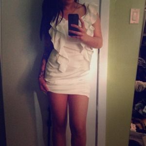 Beautiful white dress with ruffle details