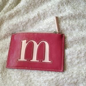 Pink initial M little makeup bag