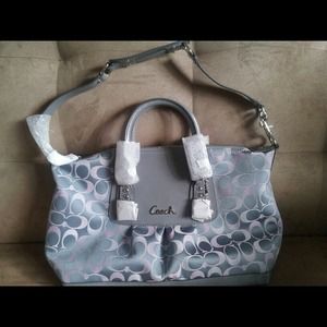 100%authentic coach with tag price.