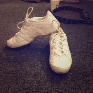 Nike's Woman's white flash cheerleading shoes