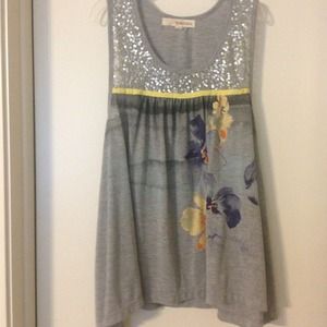 Silver tank top with sequence on the top