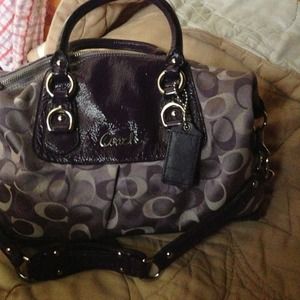 Pretty purple coach pursue, hard to find.