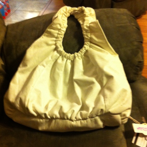 White purse one pen mark  scuffed a bit