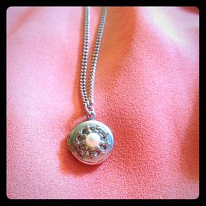 Tiny vintage silver locket