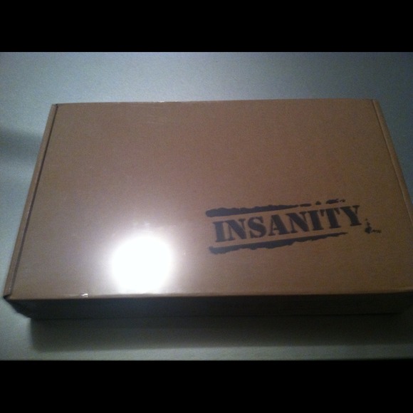 The INSANITY COMPLETE WORKOUT DVD Set NIB