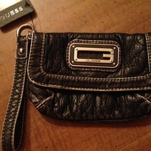 New listing ladies.  Guess wristlet with tags