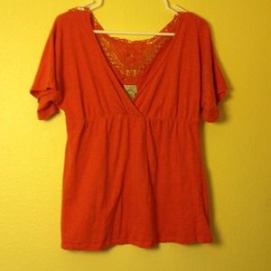 Orange v neck with crochet back