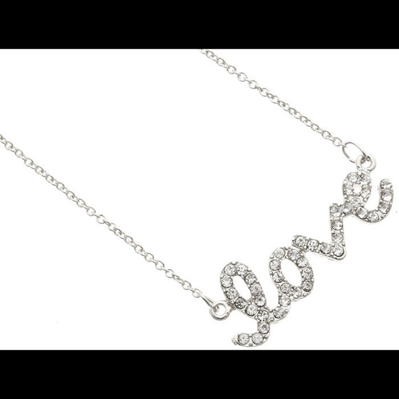 NEW! Silver rhinestone "love" necklace.
