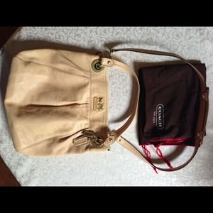 Authentic Coach leather bag with dust bag.