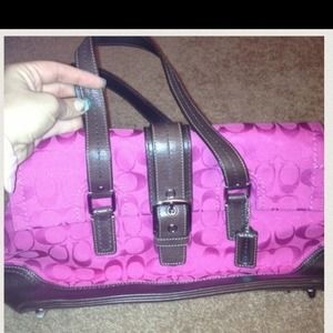 Authentic pink and brown coach shoulder bag.