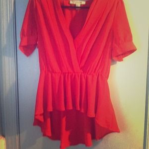 A red peplum top