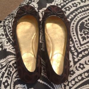 Brown coach flats
