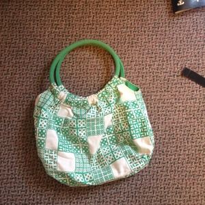 Green reversible handbag