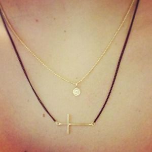 Brand New sideways cross necklace with a coin
