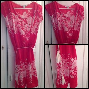 Bright orange floral dress.