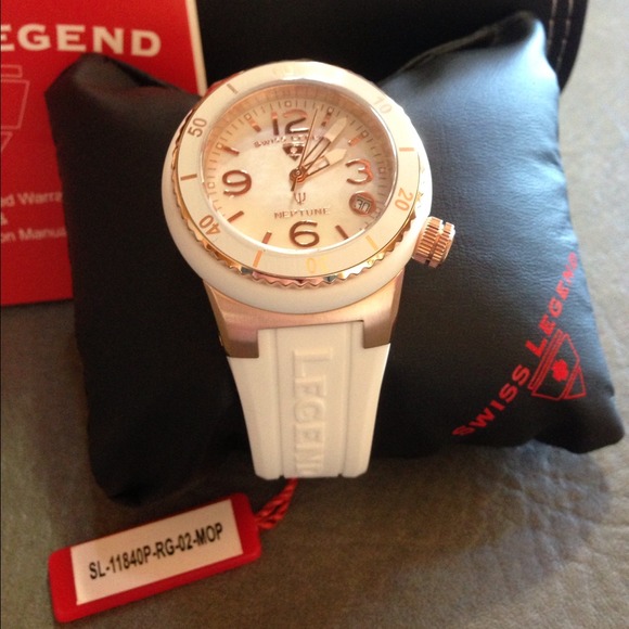 Swiss legend woman\'s white mother of pearl watch.