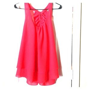 Coral color ruffled high/low blouse
