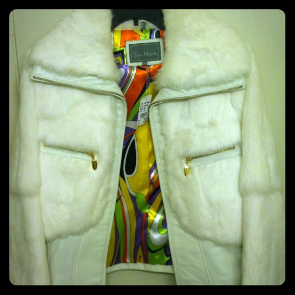 This is a Juliet Michelle white rabbit jacket.