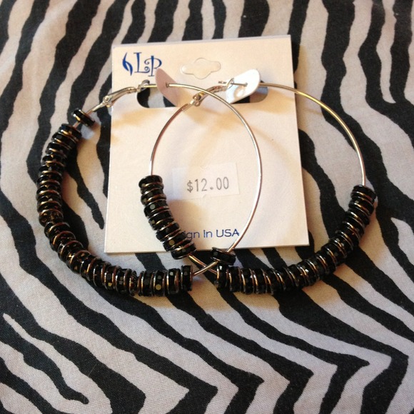 Silver colored hoops with removable black beads!