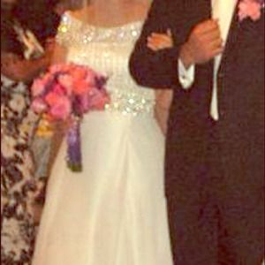 Beautiful off the shoulder beaded wedding dress