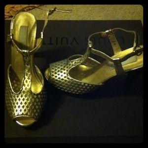 Gold leather heels. Worn once.