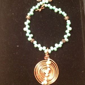 Copper wire necklace with lime shaded pearls