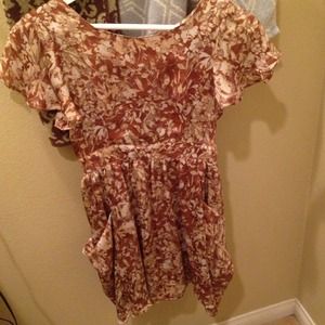 Cute flowery dress, its not too short, good length