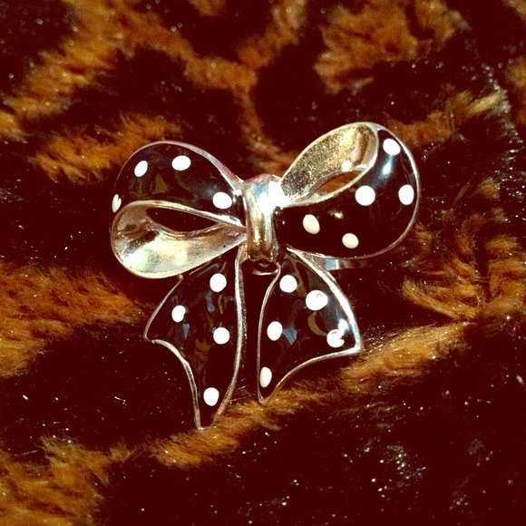Silver ring with black and white polka-dot bow :)