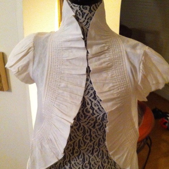 White Saks Fifth Ave shirt. Shirt has puff sleeve