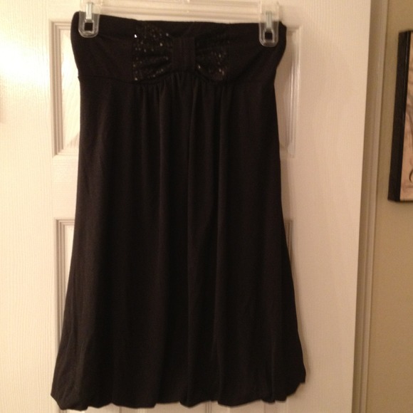 Black strapless dress.
