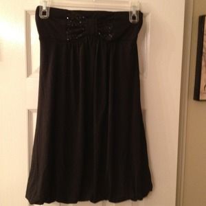 Black strapless dress.