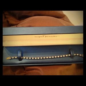 Yellow gold, sapphire, and cz tennis bracelet