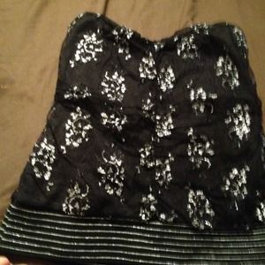 A black and silver sweetheart neckline tube top